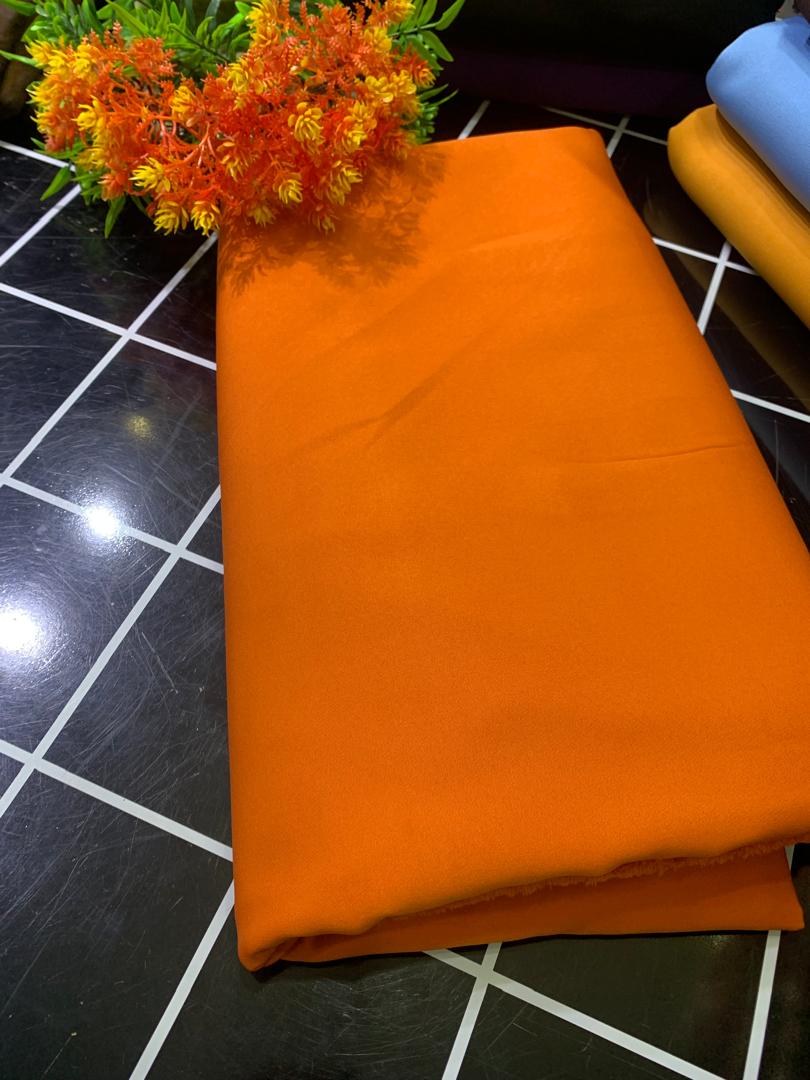 STOCK PLAIN CREPE-BURNT ORANGE (MOQ 6YRDS ABOVE)